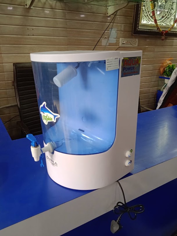 Blue Aqua Power water purifier on the shop counter